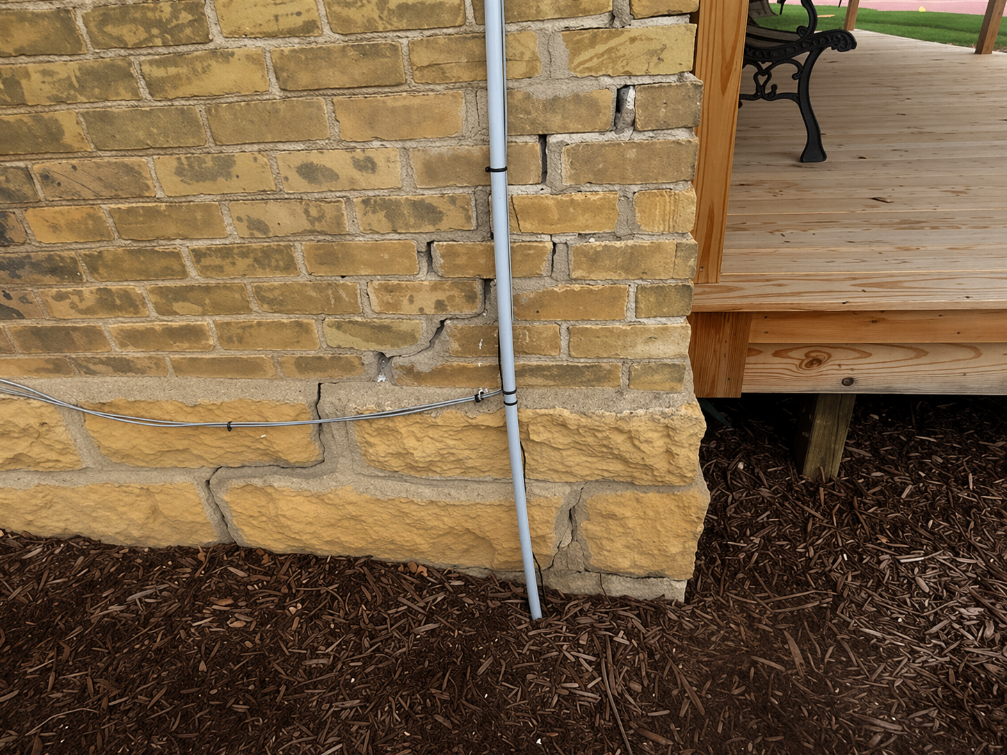 Albert Lea foundation inspection — stepped cracks in brick foundation evaluated by certified inspector