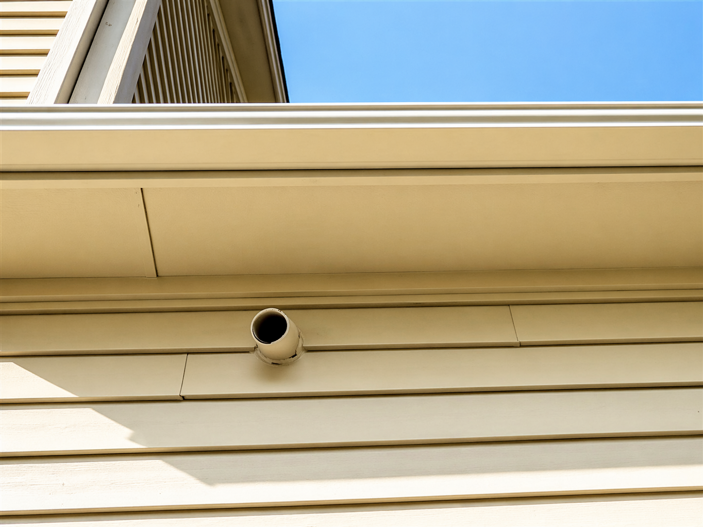 Albert Lea laundry room inspection — dryer vent termination through exterior soffit